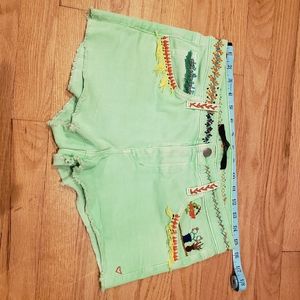 Neon green shorts hand embroidered by me